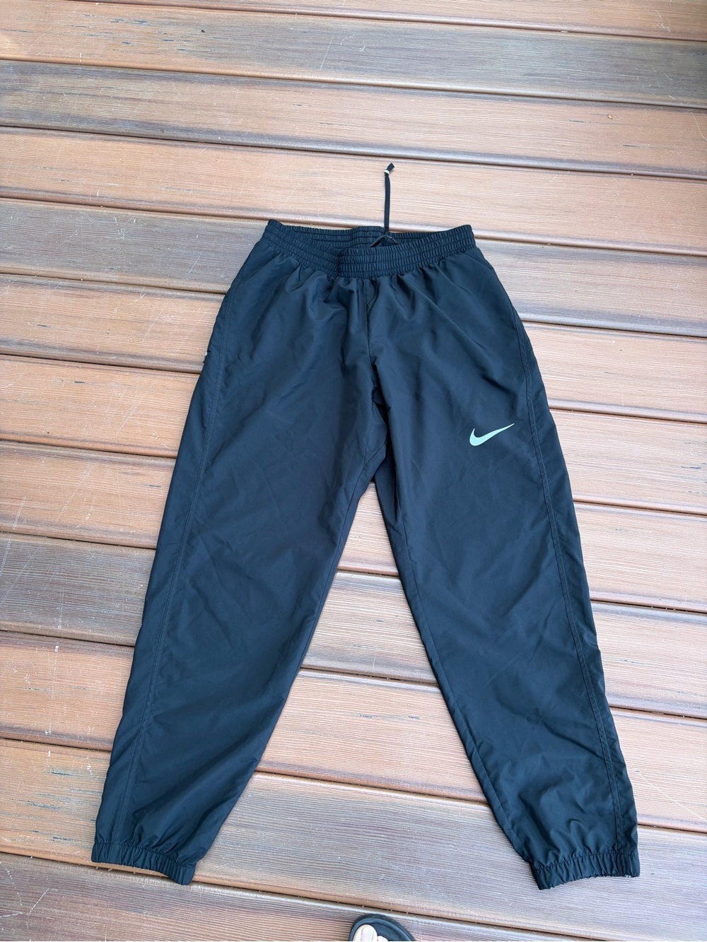 Nike Black running pants with White Care Tag